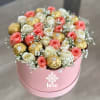 Glamorous box topped with elegant soft color roses and the perfect combination
