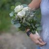 Rose color can vary to coordinate prom or event attire. Photographed here