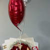 An elegant floral arrangement featuring delicate baby&#039;s breath, and a 25 exquisite