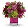 Sweet as can be. This lovely arrangement includes green miniature hydrangea and