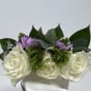 A pocket boutonniere is a charming and innovative floral accessory designed to