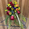 This corner arrangement pairs with the Harvest of Memories Casket Spray -