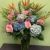 This arrangement is perfect for the tropical lover in your life. This