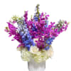 
The Tropical Bouquet is a stunning arrangement that embodies the beauty of