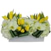This amazing arrangement of Orchids, roses amd orchids arrangement was handcrafted by