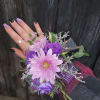 A beautiful purple corsage made with your choice of flowers. 
Options include:
