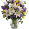 Dance into spring! Send this feminine bouquet of favorite spring flowers to
