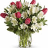 A combination of pink tulips and white alstroemerias couldn&rsquo;t be better, all