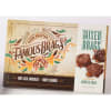 A box of milk and dark chocolates with honey caramel and pecans.