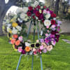 24 inches wreath  with polychromatic colors. we will deliver for your
