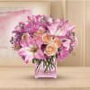 Impossibly pretty. This decidedly feminine arrangement is absolutely delightful.
Perfectly peachy peach spray