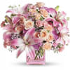 Impossibly pretty. This decidedly feminine arrangement is absolutely delightful.
Perfectly peachy peach spray