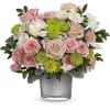 Nothing delights like the prettiest pink roses, artistically arranged in a shimmering