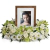 An exquisite round wreath with blooms inspired by the lasting impressions a