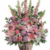 A touching tribute to a beloved woman, this beautiful, soft pink and