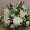 Soft and soothing, this arrangement features beautiful white hydrangeas and soft roses