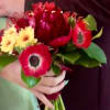 A small handheld bouquet for prom&mdash;often called a posey or nosegay&mdash;is a
