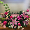 This elegant floral arrangement is designed to honor a loved one&rsquo;s memory