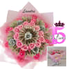 Floral arrangement for a quinceanera, decorated with bills, crystals, a crown, and