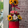 Sunflower arrangement with lilies for any occasion.