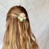 Featuring a delicate design, our petite hair clips showcase beautiful flowers and