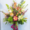 A bright palette of our freshest flowers in a large dramatic presentation.