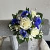 Photographed are multiple examples of corsages that we have made, you can