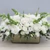 One of our newest creations. Roses, spray roses, and huck green arranged