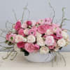 This elegant, beautiful arrangements has all our favorite roses. The photo shown