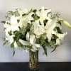 Casa blanca lilies make up this grand arrangement. It&#039;s looks aren&#039;t the