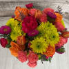 HOT To Go is a bold and fiery floral arrangement designed to