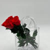 PRESERVED ROSES
Nestled within the heart of this exquisite handbag-shaped vase are meticulously