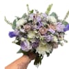 Mix of all white &amp; lavender flowers arranged beautifully in small handheld