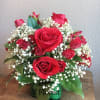 This bouquet includes the following: red roses, red spray roses and baby&#039;s