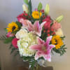 Designer&#039;s choice of pink lilies, pink roses, hot pink roses, lavender roses