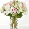 The Kindhearted Bouquet is a gentle swirl of pale pink and ivory