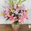 Description:

"Lavender Dreams" is a stunning floral arrangement that beautifully blends the elegance