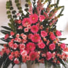 mix of pink and green flowers in white vase