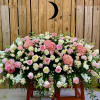 This pastel colored Casket Spray would be a perfect token of soft