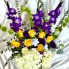 Beautiful arrangement made of colorful roses, gladiolus, hydrangeas, Bells of Ireland, Peruvian