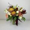 Pastel corals/yellows paired with burgundy and white flowers