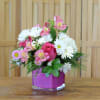 This cute and dainty floral arrangement will warm your heart. Low cluster