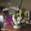 Phalaenopsis, cymbidium, calla lilies, dendrobium with other spring flowers 

