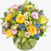 An exuberant bouquet of flowers that is assured to bring a touch