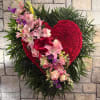 Carnation heart with assorted colored flowers