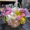 Classic and Beautiful, this arrangement whispers luxury. Soft pinks, whites and creams