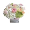 Classic and Beautiful, this arrangement whispers luxury. Soft pinks, whites and creams
