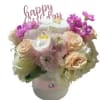 Classic and Beautiful, this arrangement whispers luxury. Soft pinks, whites and creams