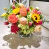 This burst of colors blooms is so fun filled with roses, tulips