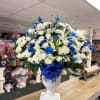 Large arrangement for funeral, white roses, lilies, daisies and foliages